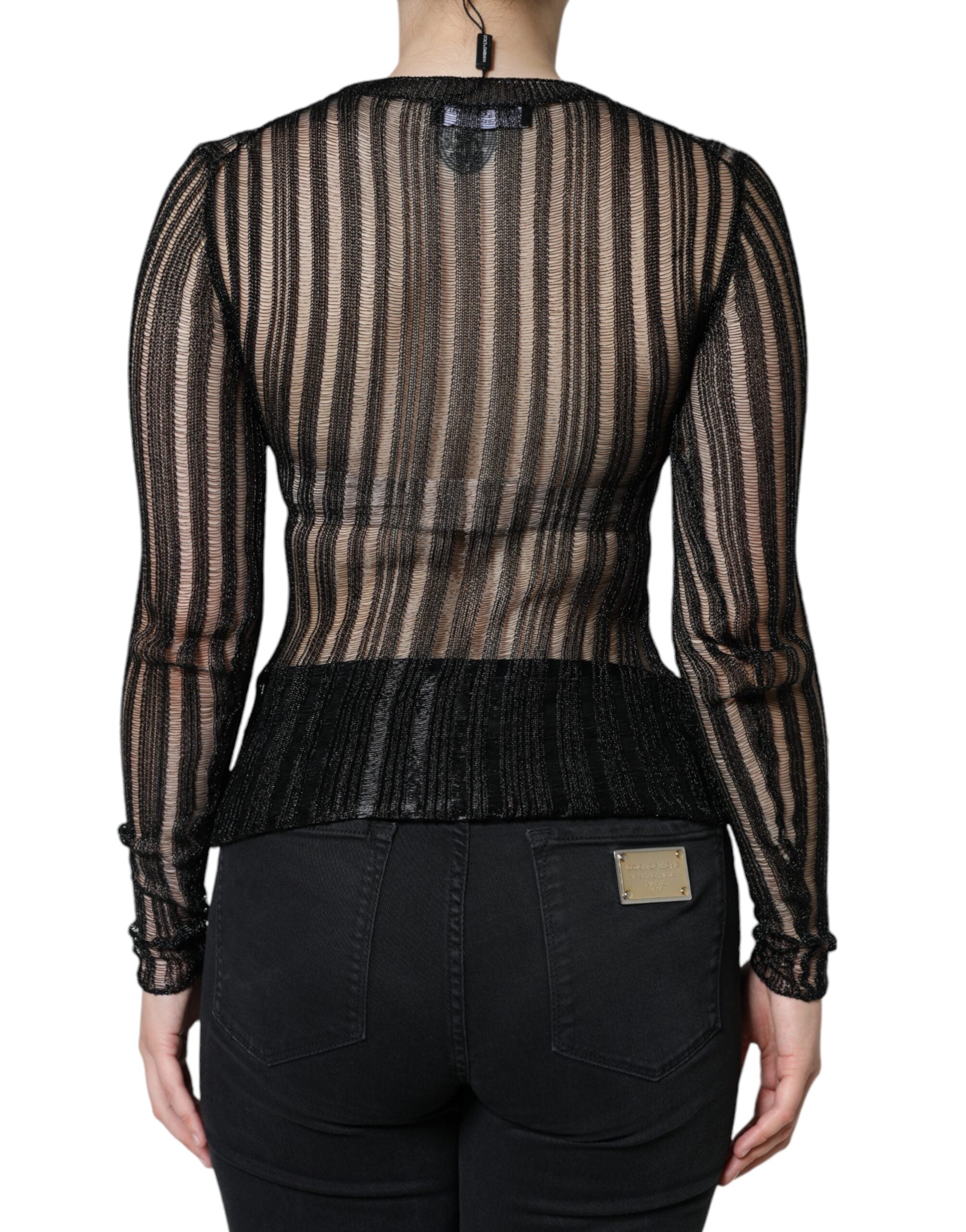 Top transparent à manches longues Dolce & Gabbana à rayures noires, style élégant et sophistiqué.