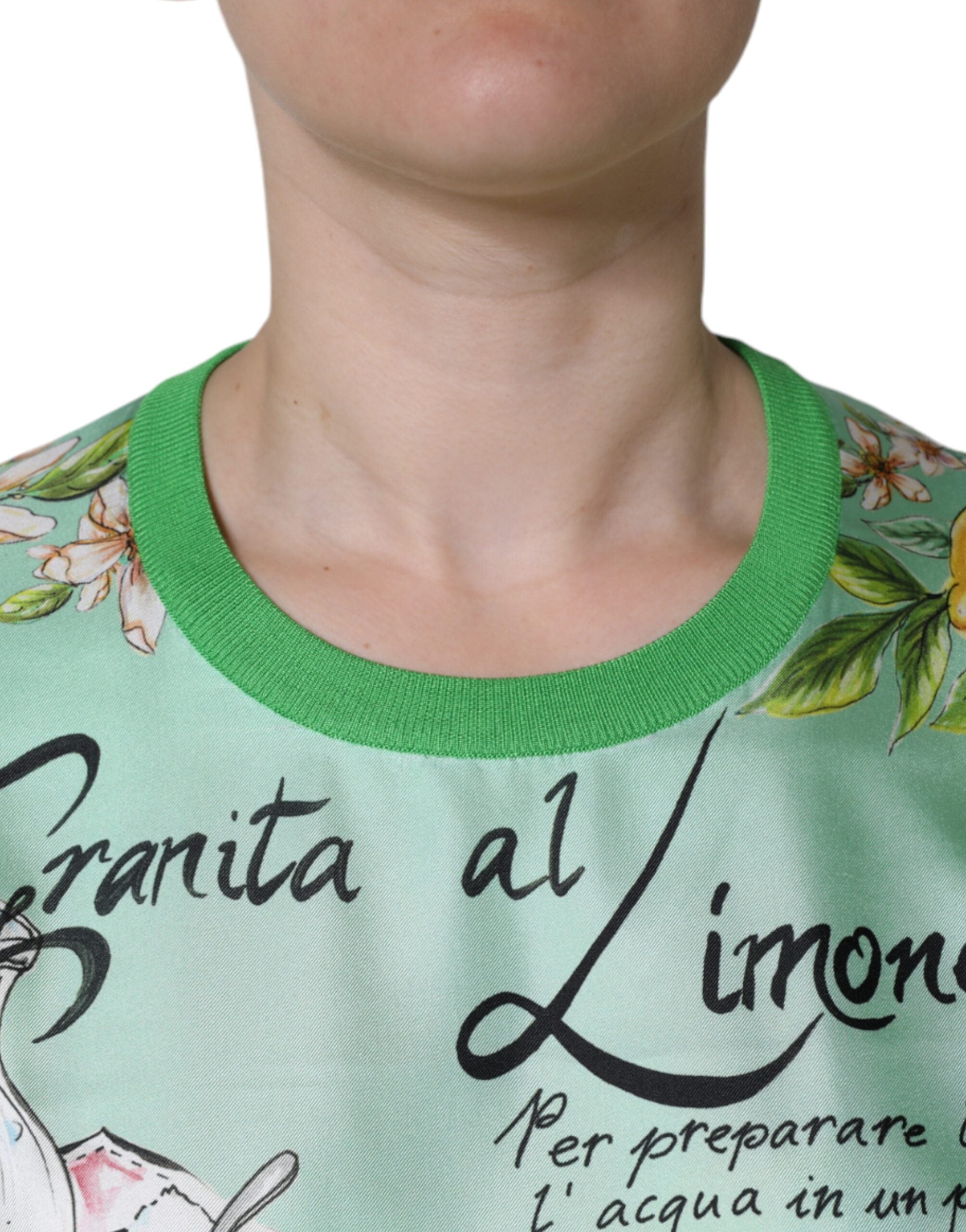 Pull Dolce & Gabbana en soie verte avec manches longues et motif Granita Al Limone, vue de face.