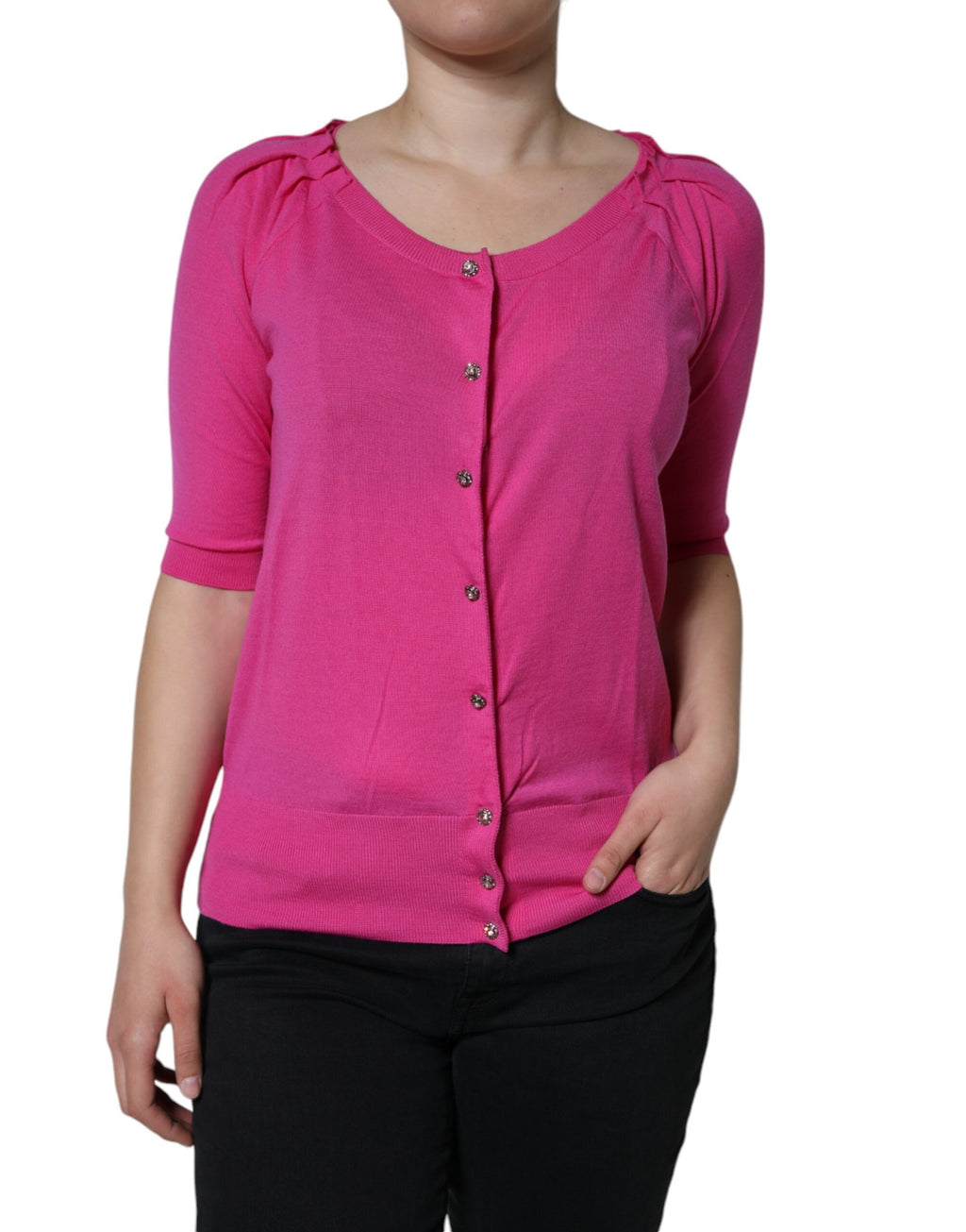Blouse courte en laine rose Dolce & Gabbana avec boutons et manches courtes, élégante et sophistiquée.