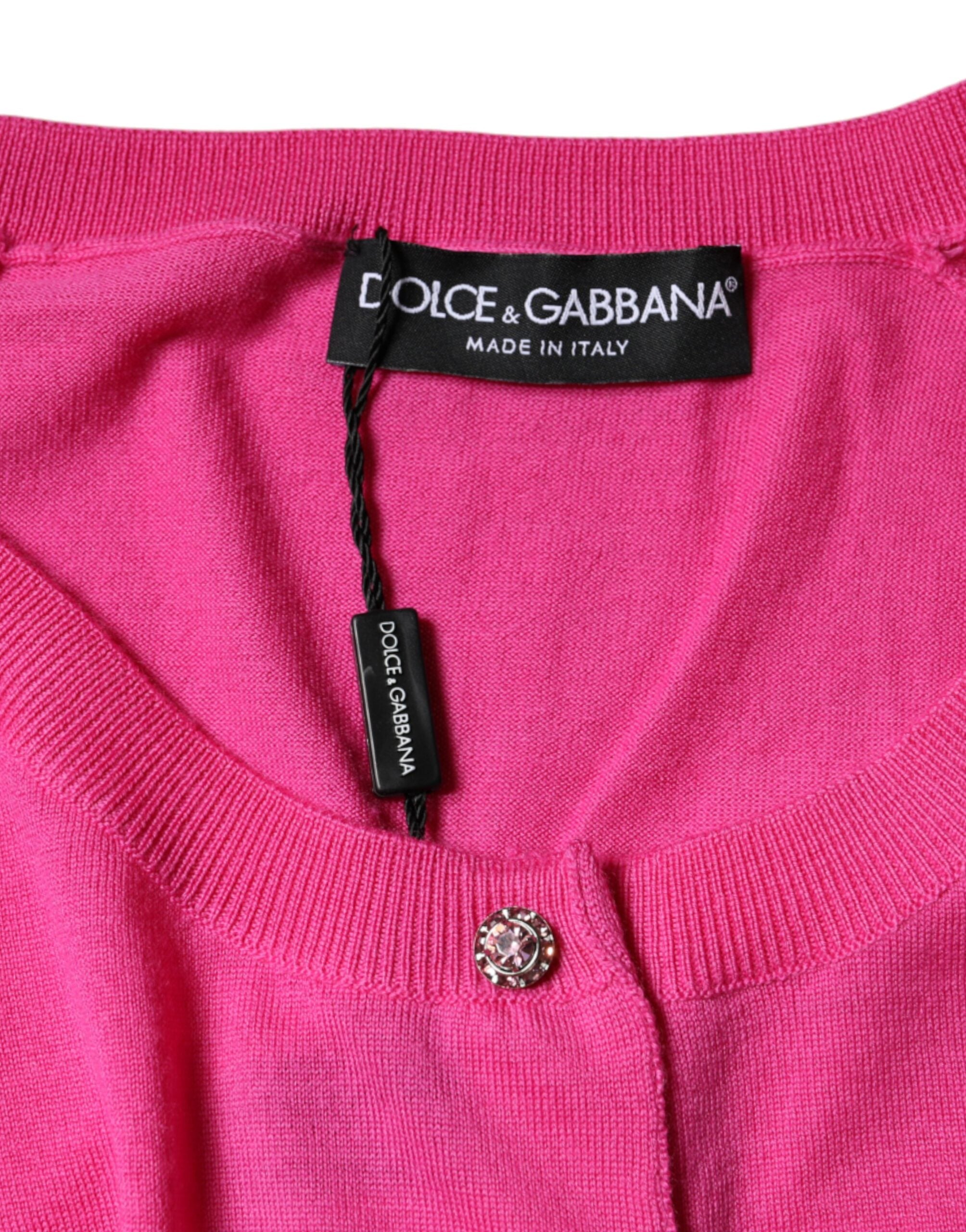 Chemise Dolce & Gabbana en laine rose à manches courtes avec boutons, élégante et légère.