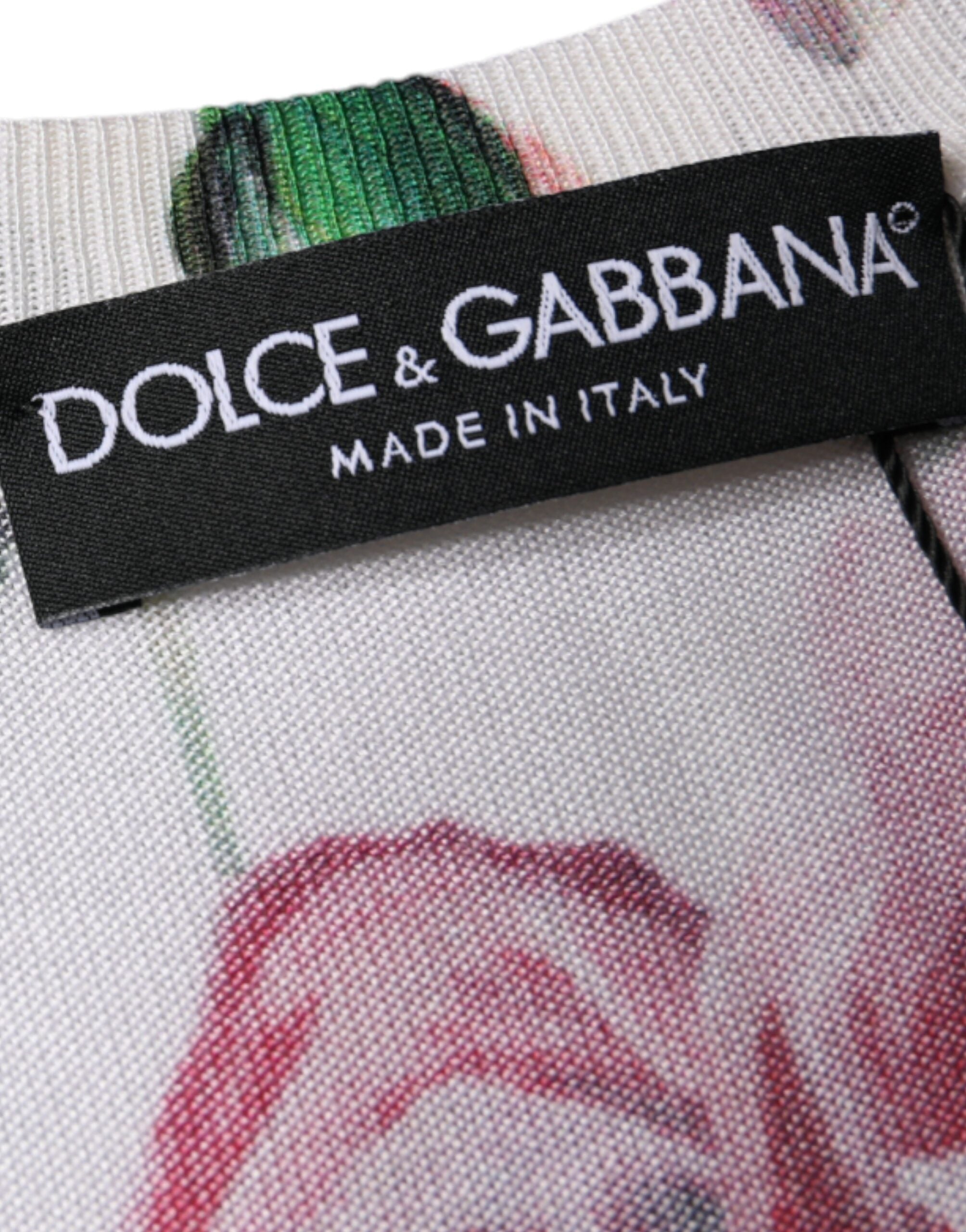 Top sans manches en soie blanche à fleurs en dentelle de Dolce & Gabbana, détails délicats et style élégant.