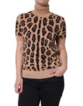 Pull en laine beige à motif léopard Dolce & Gabbana, col roulé élégant et chaud, pour un style sophistiqué.
