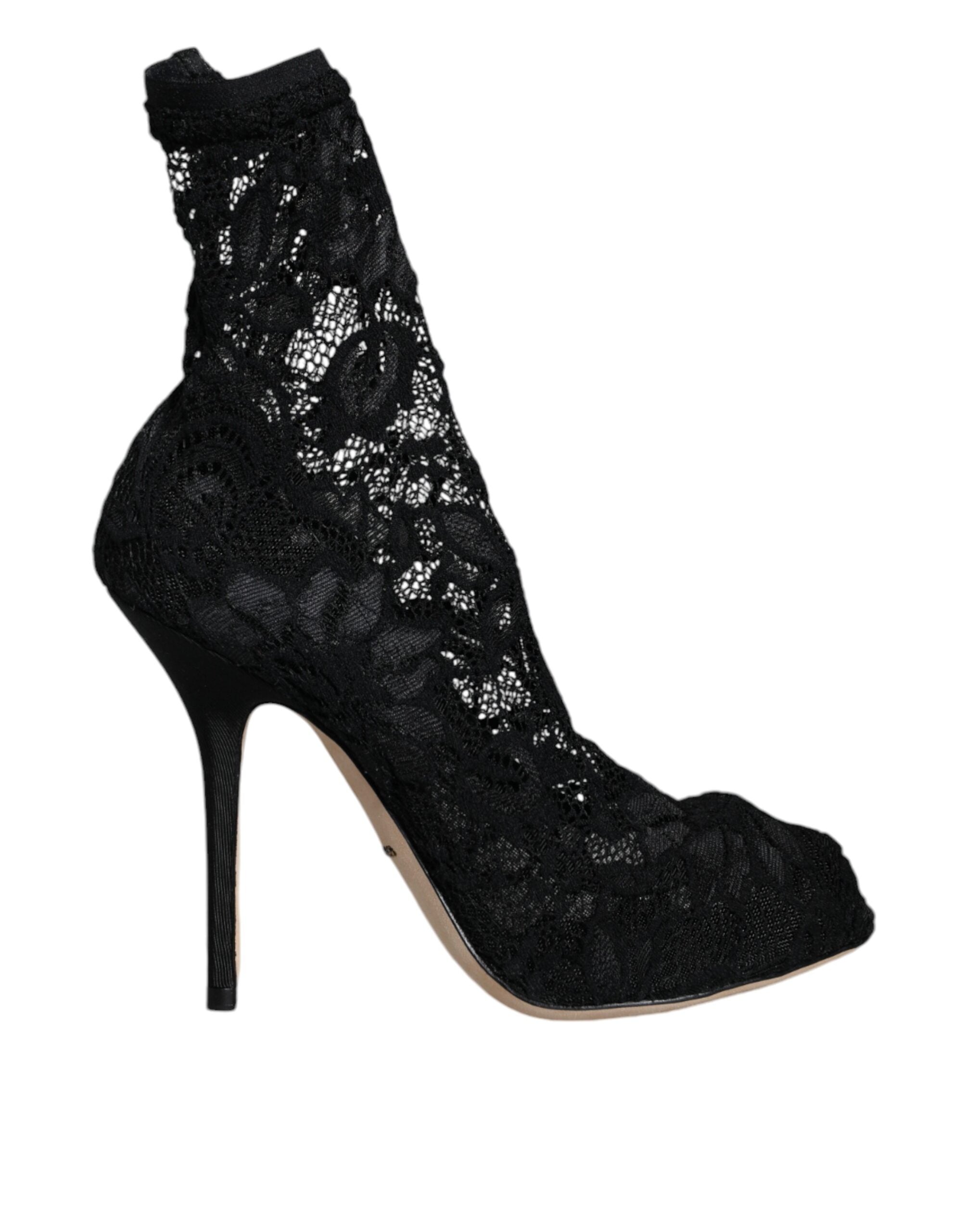 Chaussures à talons Dolce & Gabbana en dentelle noire, bottines mi-mollet élégantes, avec semelle en cuir et design sophistiqué.
