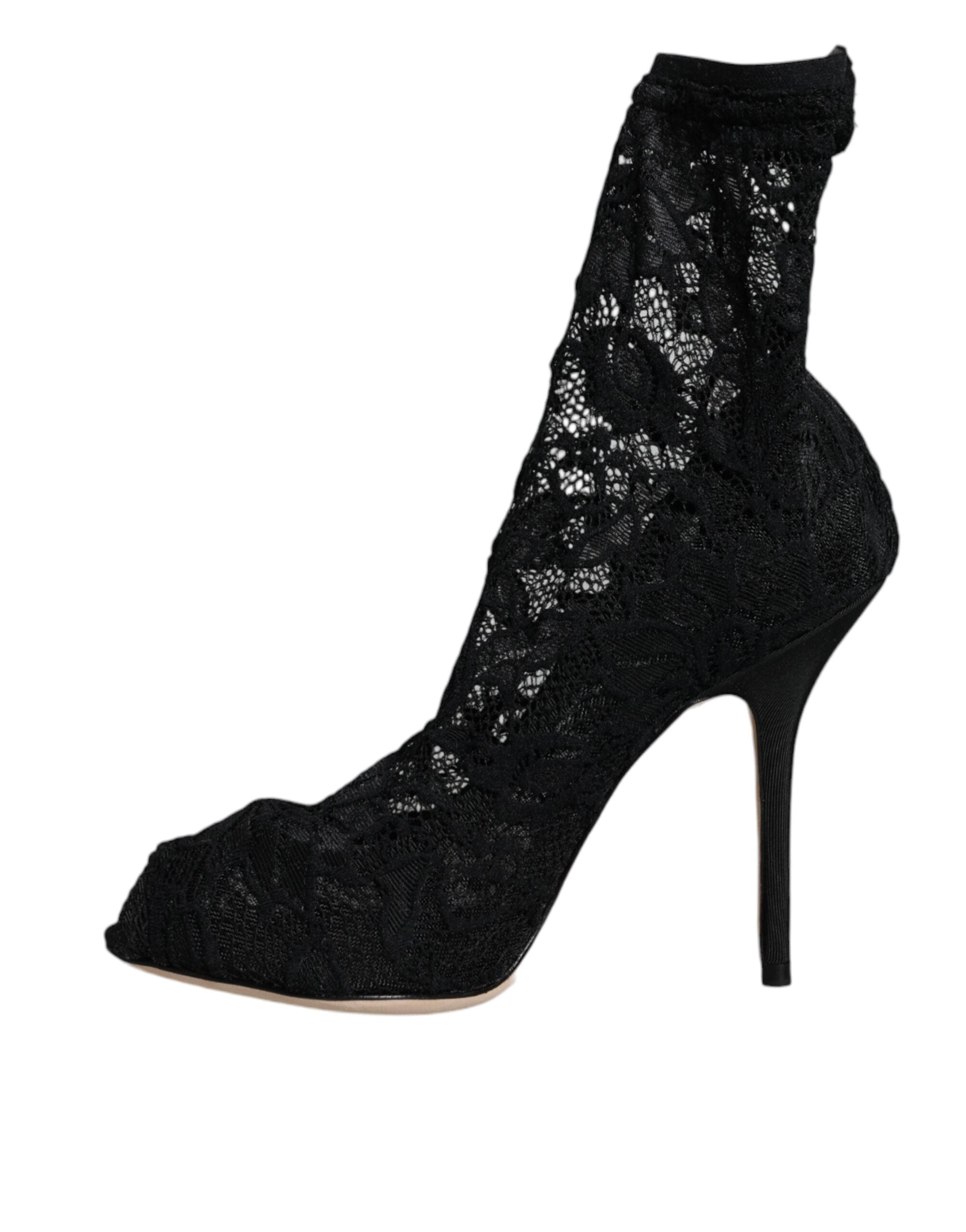 Chaussures Dolce & Gabbana à talons noirs en dentelle extensible et bottines mi-mollet élégantes.