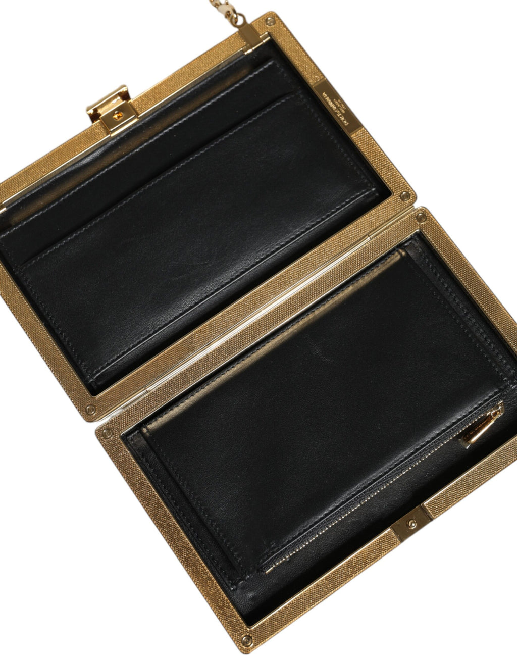 Sac clutch en cuir bordeaux Dolce & Gabbana pour soir, avec bandoulière élégante et détails sophistiqués.