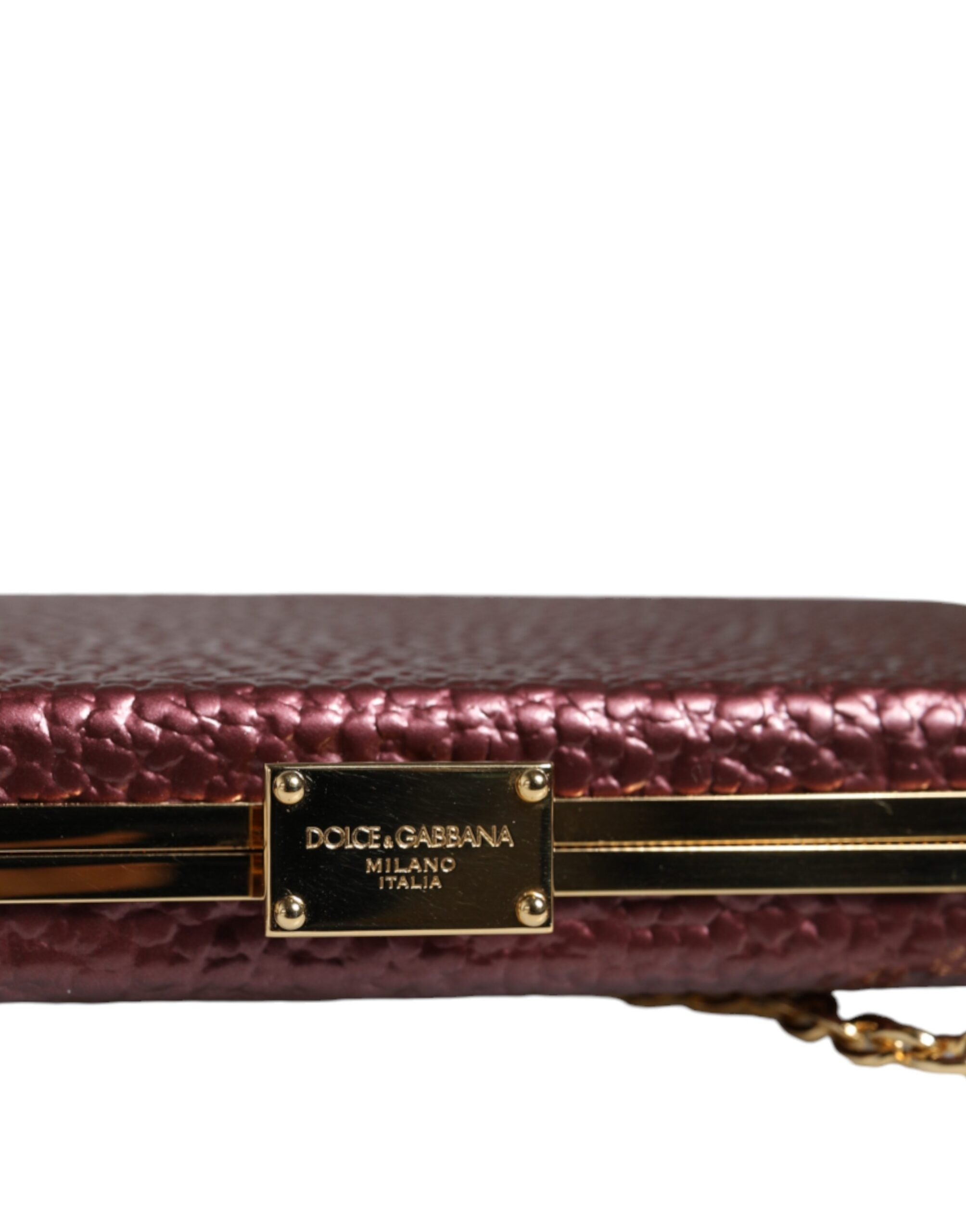 Sac clutch en cuir bordeaux Dolce & Gabbana, élégant sac de soirée croisé avec fermeture métallique et design sophistiqué.