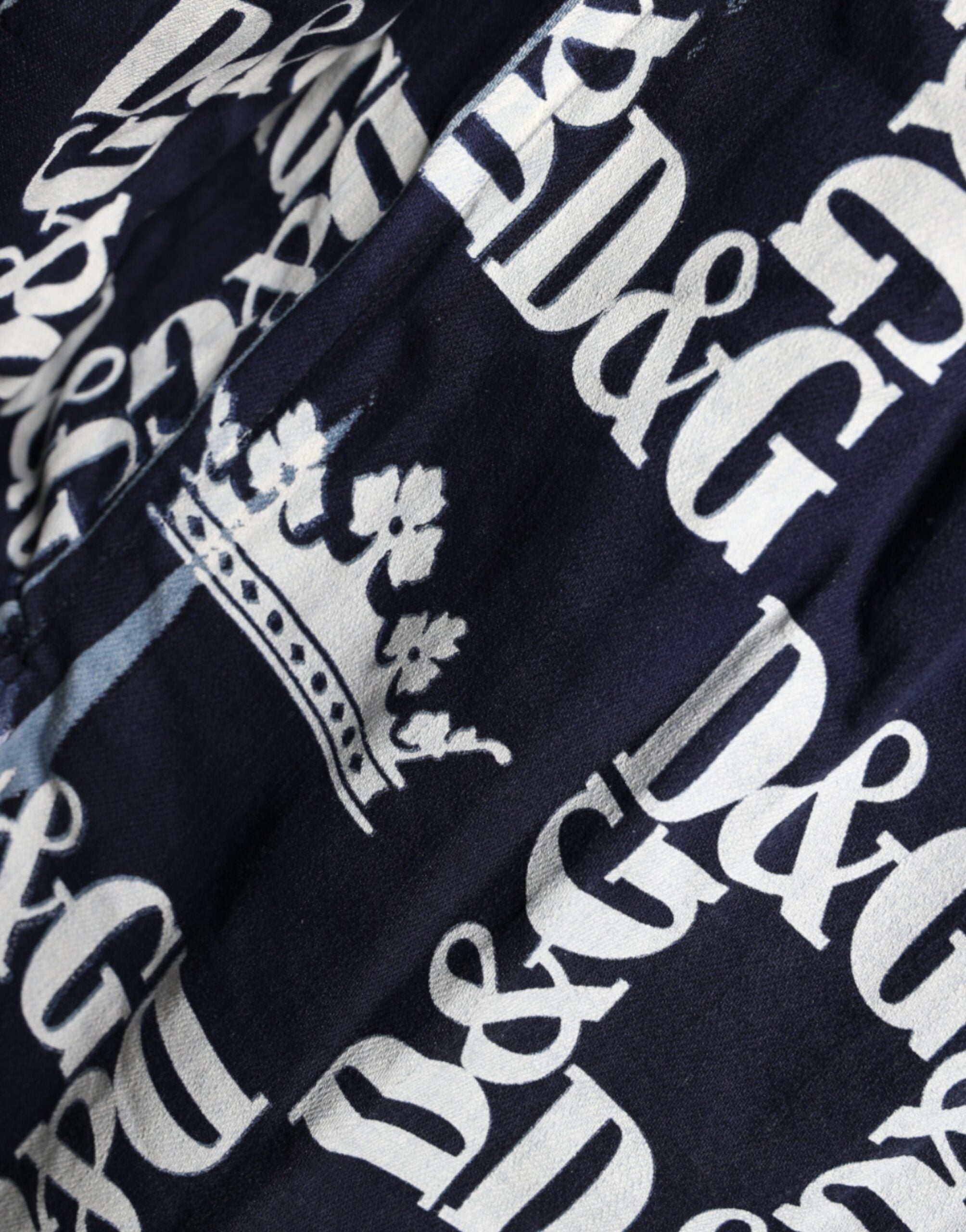 Chemise slim en coton Dolce & Gabbana avec logo couronne bleu et imprimé élégant, coupe ajustée.