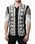 Chemise en soie blanche et noire Dolce & Gabbana avec studs, pierres et cristaux, style élégant et sophistiqué.