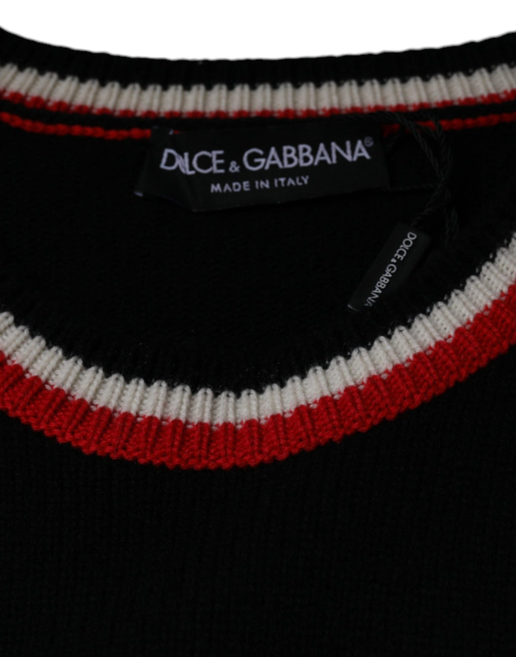 Pull Dolce & Gabbana en cachemire noir avec motif de cochon, confection de luxe pour un style élégant.