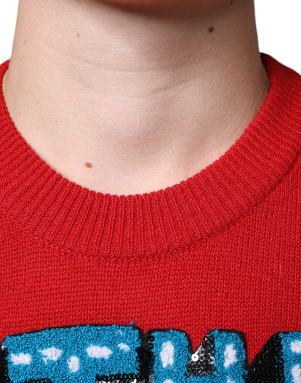 Sweatshirt en laine rouge Dolce & Gabbana "I'm The King" à col rond, style décontracté et logo visible.