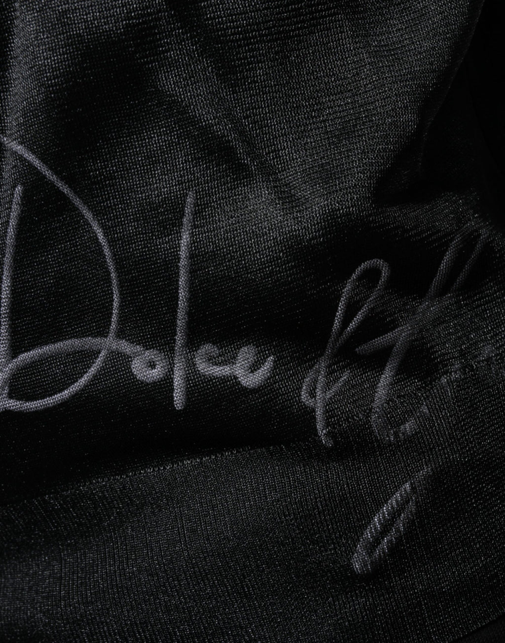 Sweat-shirt noir en polyester de Dolce & Gabbana, pull-over décontracté avec col rond et logo discret visible sur le devant.