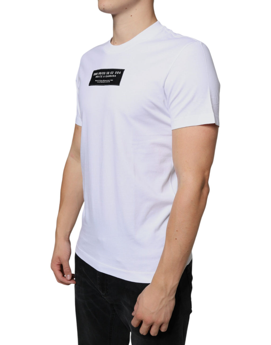 T-shirt casual blanc en coton Dolce & Gabbana avec application DG, vue de devant avec logo visible.