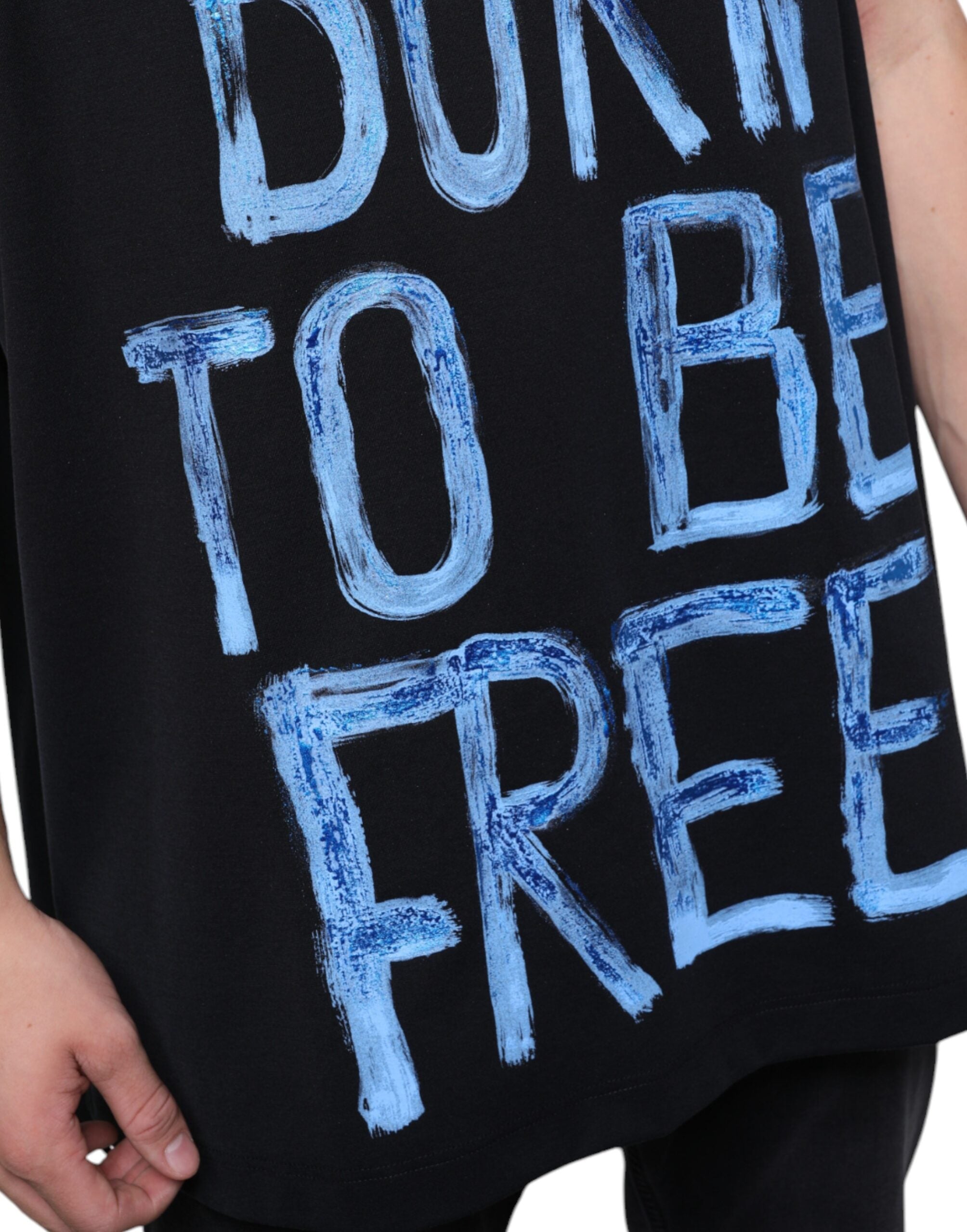 T-shirt sans manches en coton noir Dolce & Gabbana avec motif "Born To Be Free" imprimé, vue de face.