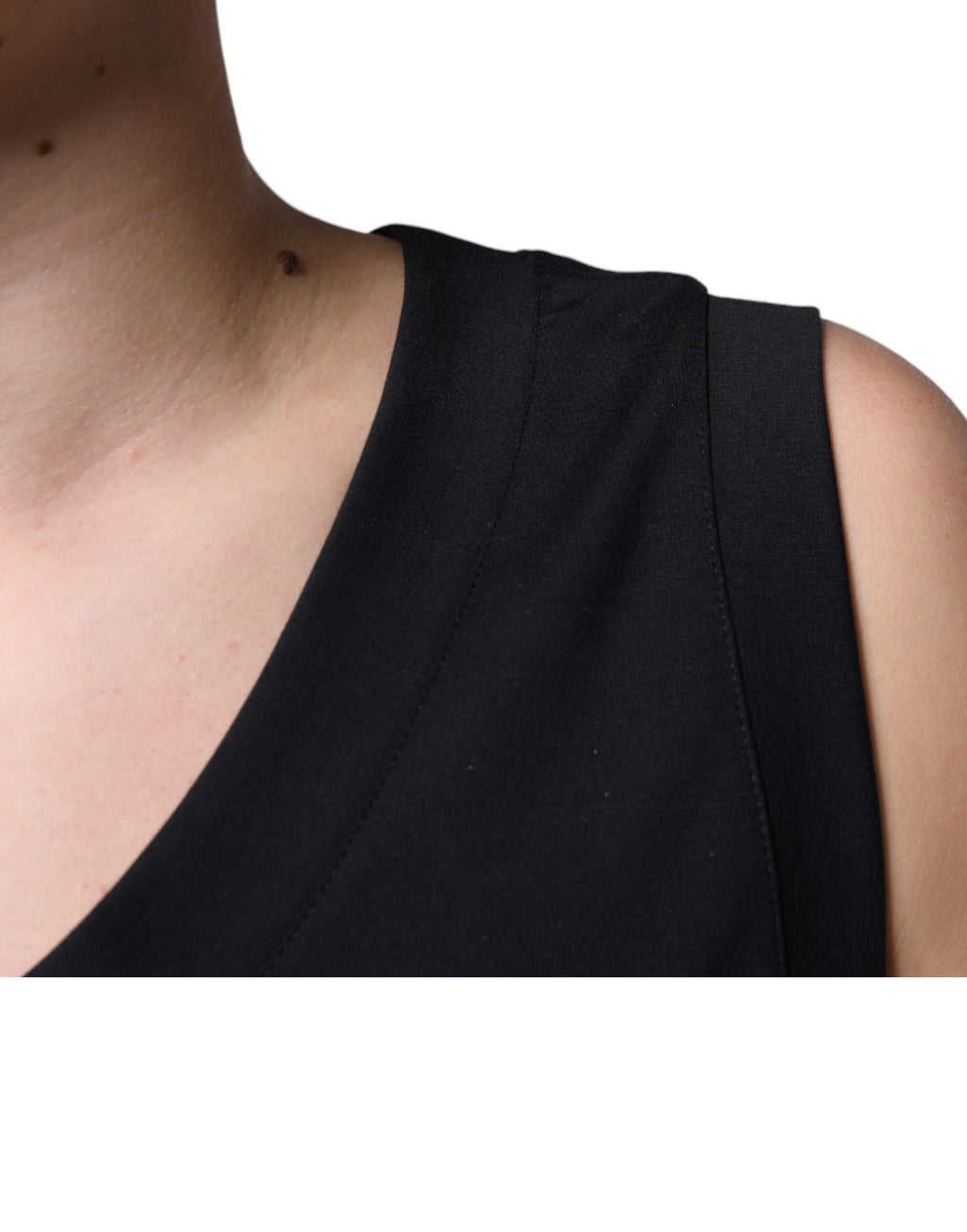 T-shirt sans manches noire Dolce & Gabbana en coton avec motif "Born To Be Free" visible sur le devant.