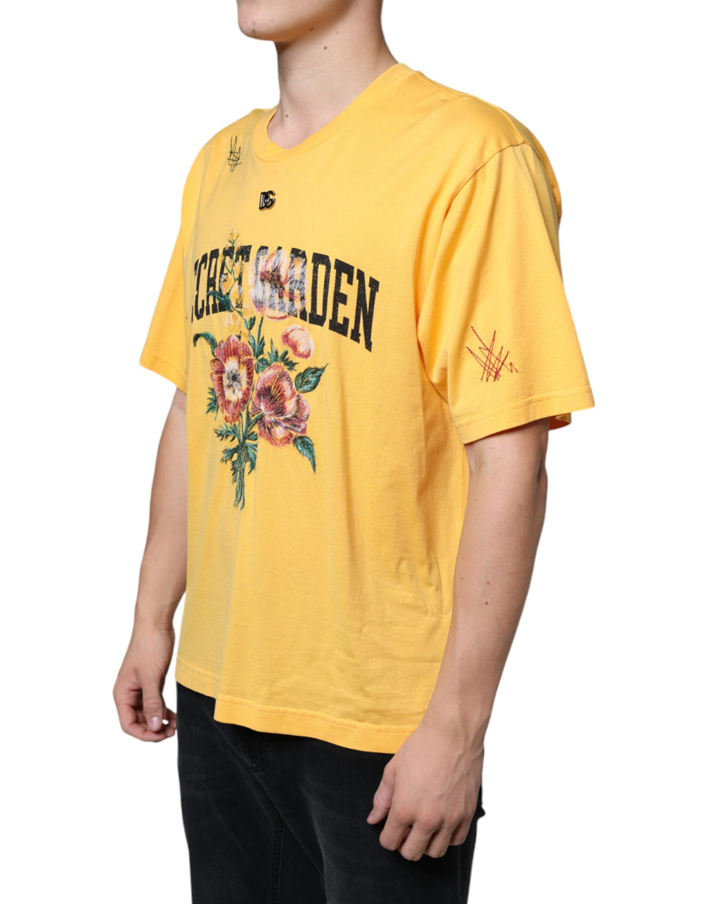 T-shirt blanc à col rond Dolce & Gabbana avec motif floral jaune et coton, visible sur l'image.