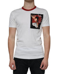 T-shirt blanc en coton Dolce & Gabbana avec imprimé graphique, col rond et design moderne visible sur l'image.