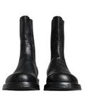 Bottes en cuir noir Dolce & Gabbana, bottes mi-mollet avec design élégant et détails en cuir pour femmes.