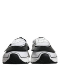Chaussures Sneakers Dolce & Gabbana Daymaster blanches et noires avec logo en plaque, vue de face.