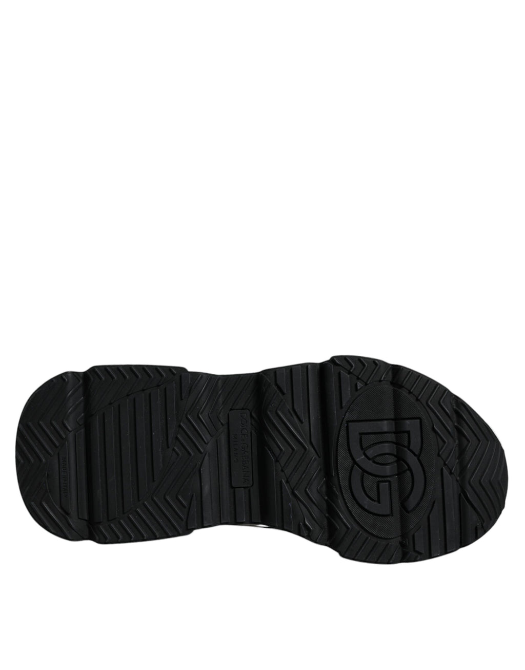 Sneakers Daymaster blanches et noires Dolce & Gabbana avec logo en plaque, chaussures de mode élégantes et décontractées.