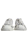 Chaussures sneakers basses blanches Dolce & Gabbana avec lacets en dentelle, style décontracté et élégant.