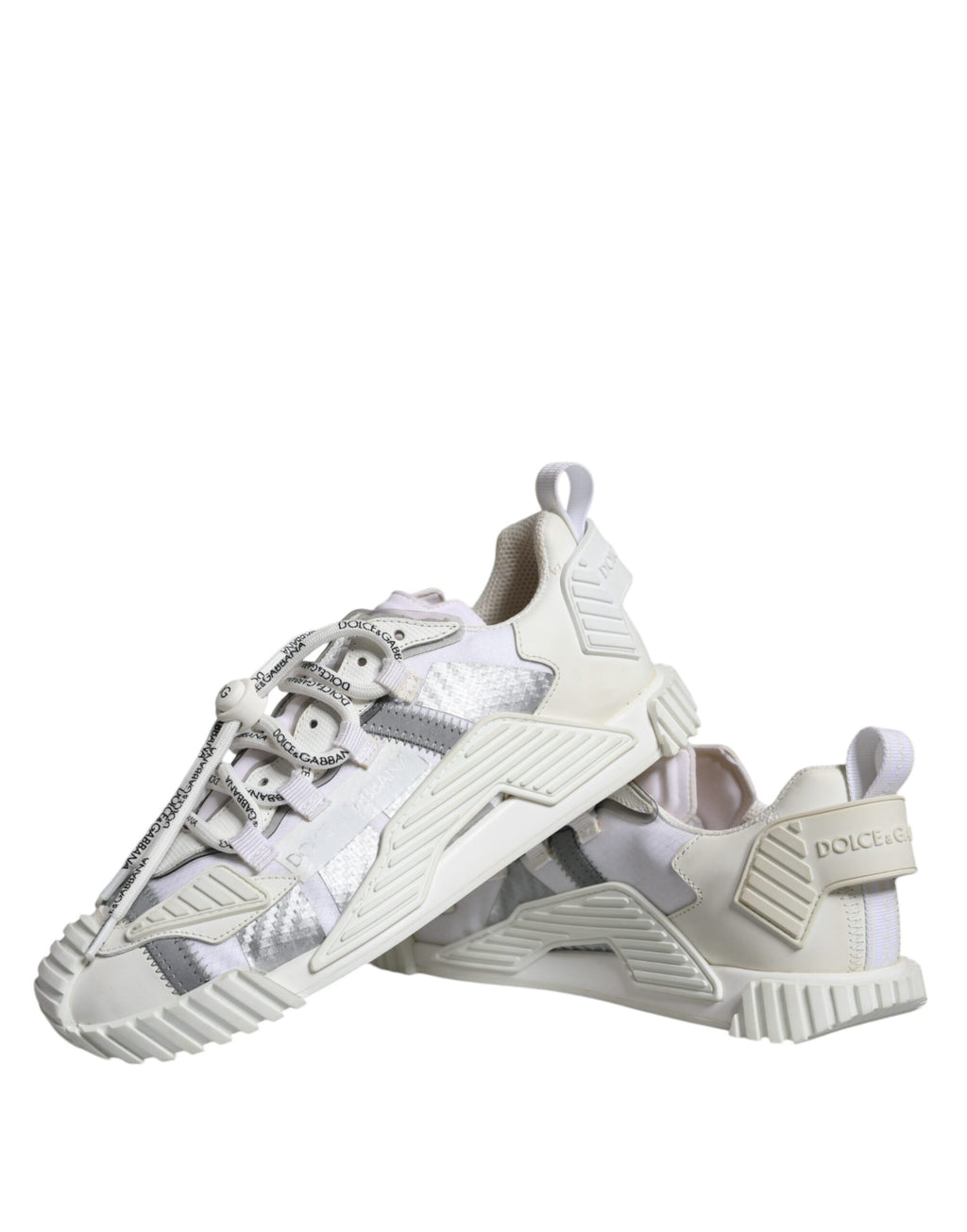 Chaussures sneakers basses blanches Dolce & Gabbana en dentelle avec laçage, style décontracté et élégant.