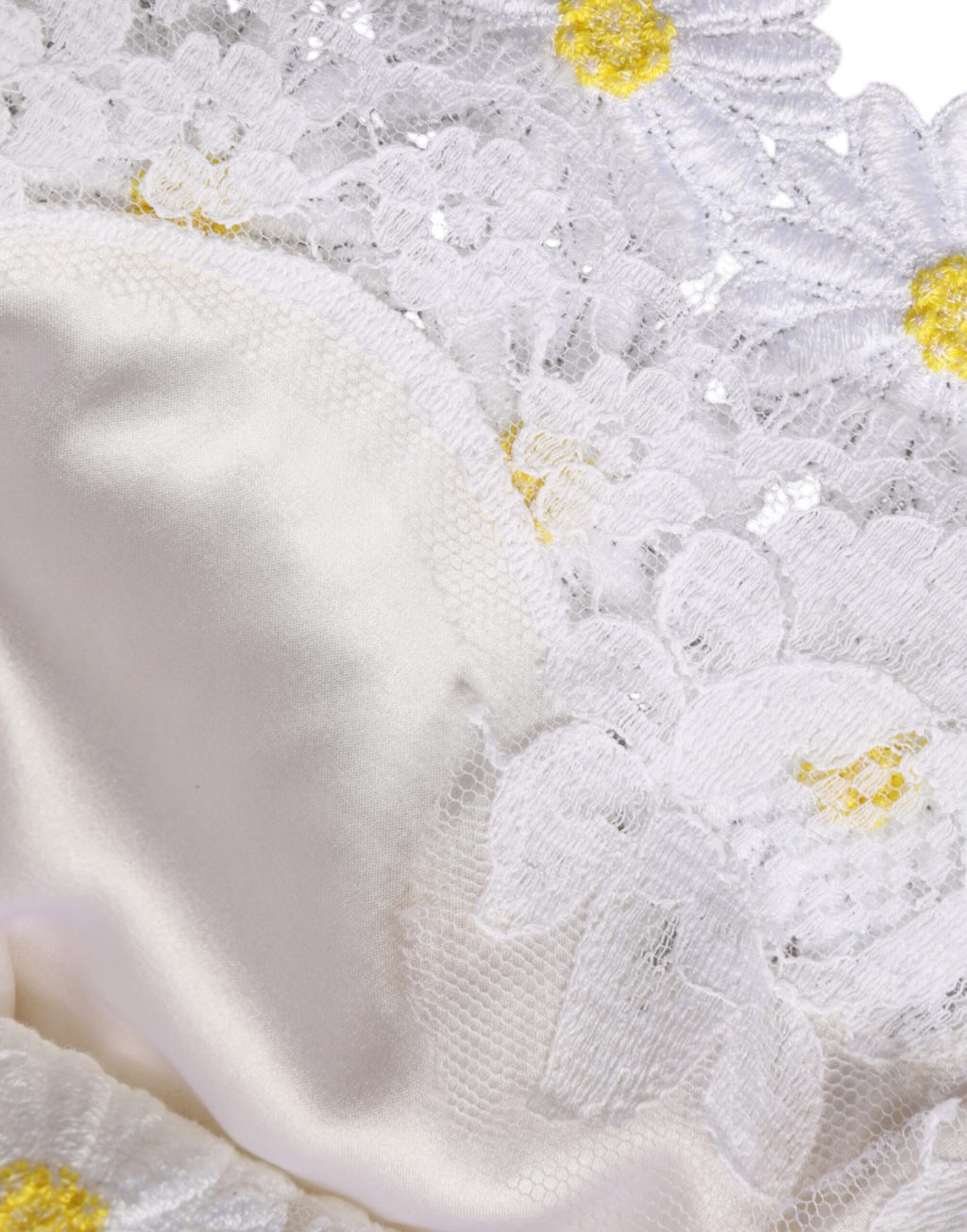 Robe midi en dentelle de macramé blanche Dolce & Gabbana avec motif de marguerite, style élégante et féminine.