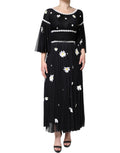 Robe longue noire en soie avec motif de marguerites, style A-line Dolce & Gabbana, élégante et fluide.