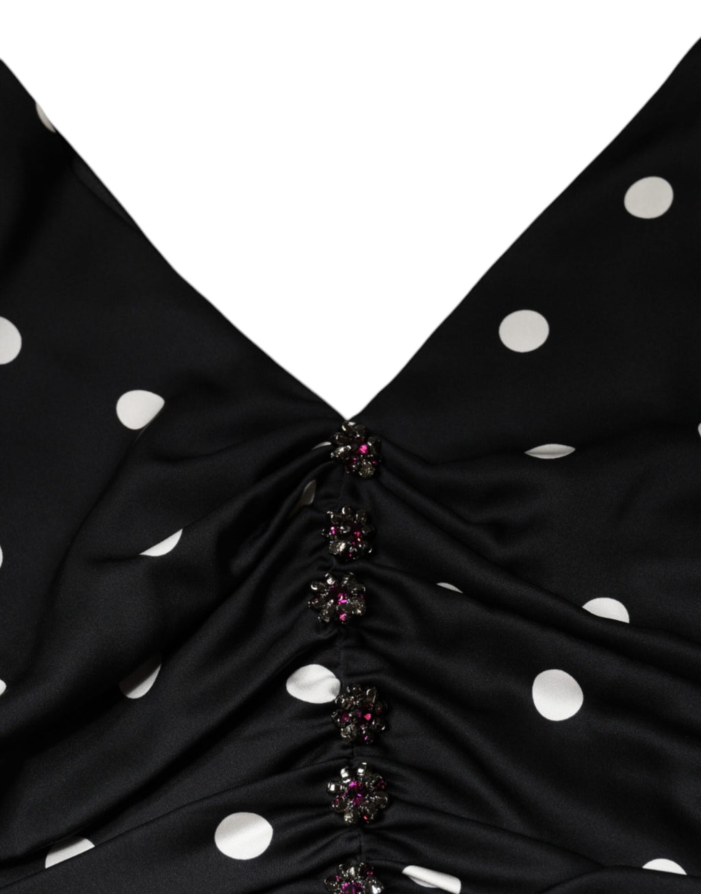 Robe midi noire en soie à pois Dolce & Gabbana avec décolleté en V et franges, style élégant et sophistiqué.