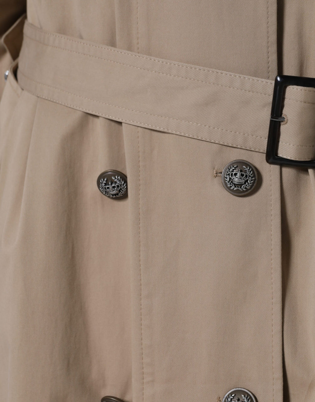 Manteau trench ceinture double boutonnage beige khaki Dolce & Gabbana pour femme, en tissu léger et élégant.