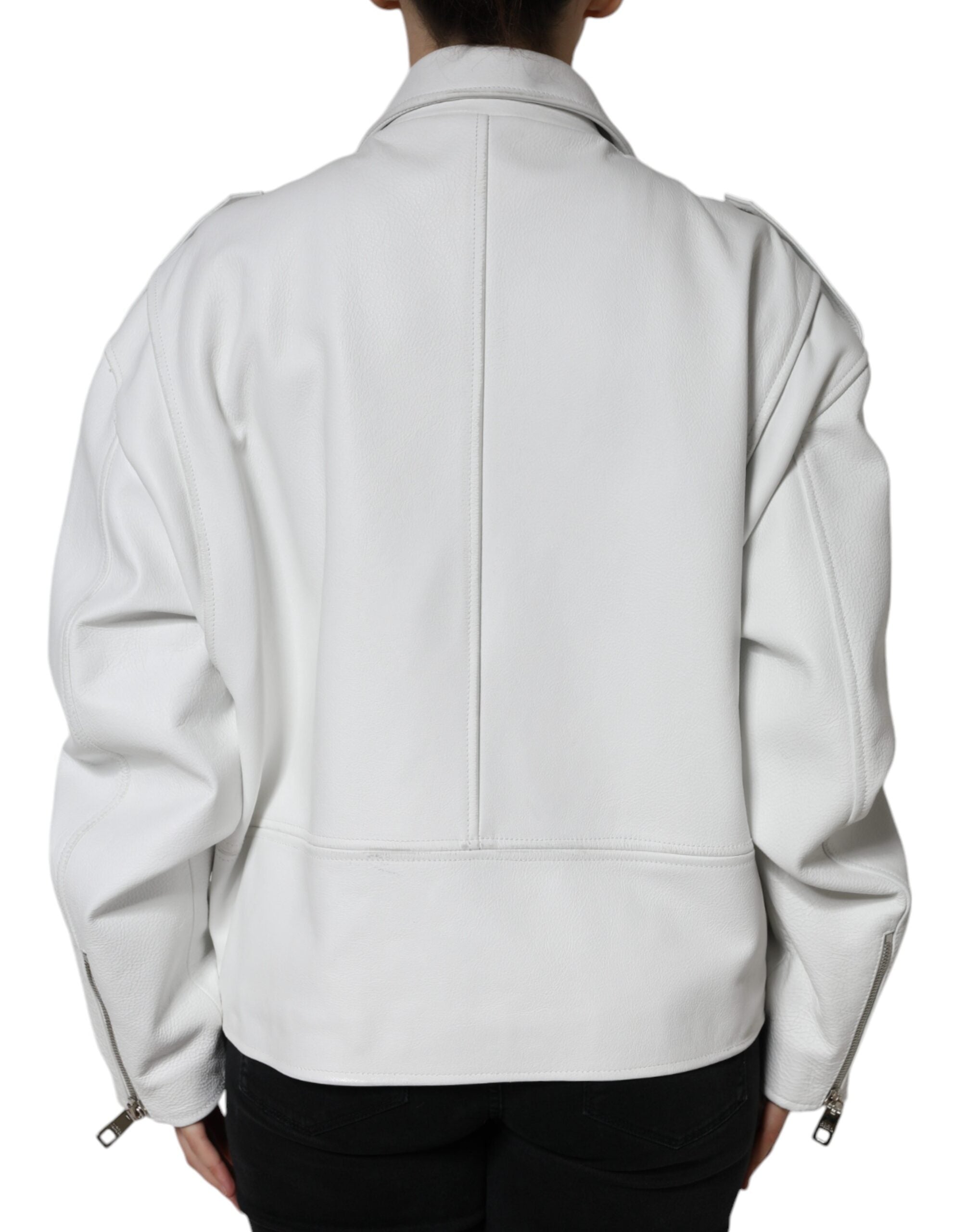 Veste en cuir d'agneau blanche Dolce & Gabbana, coupe motard, avec détails élégants et fermeture éclair visible.