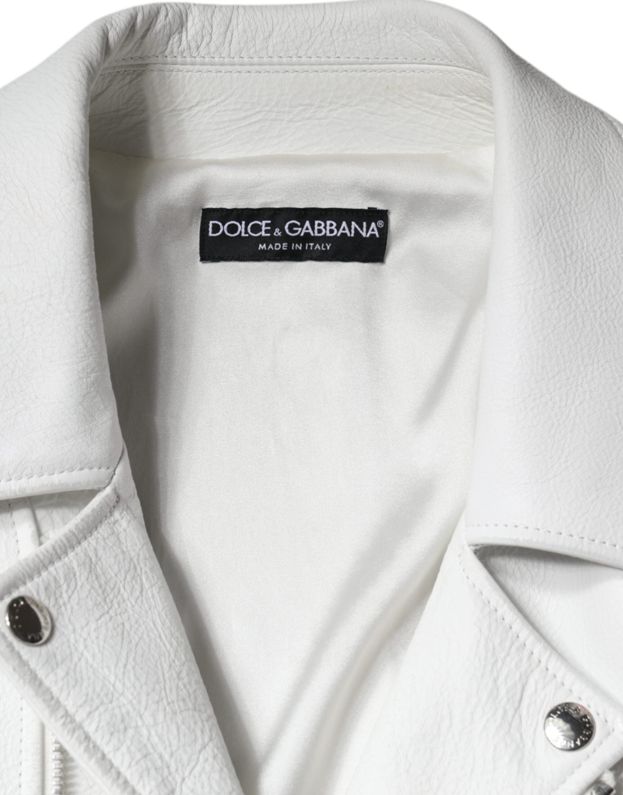 Blouson motard en cuir d'agneau blanc de Dolce & Gabbana, coupe élégante et détails sophistiqués.
