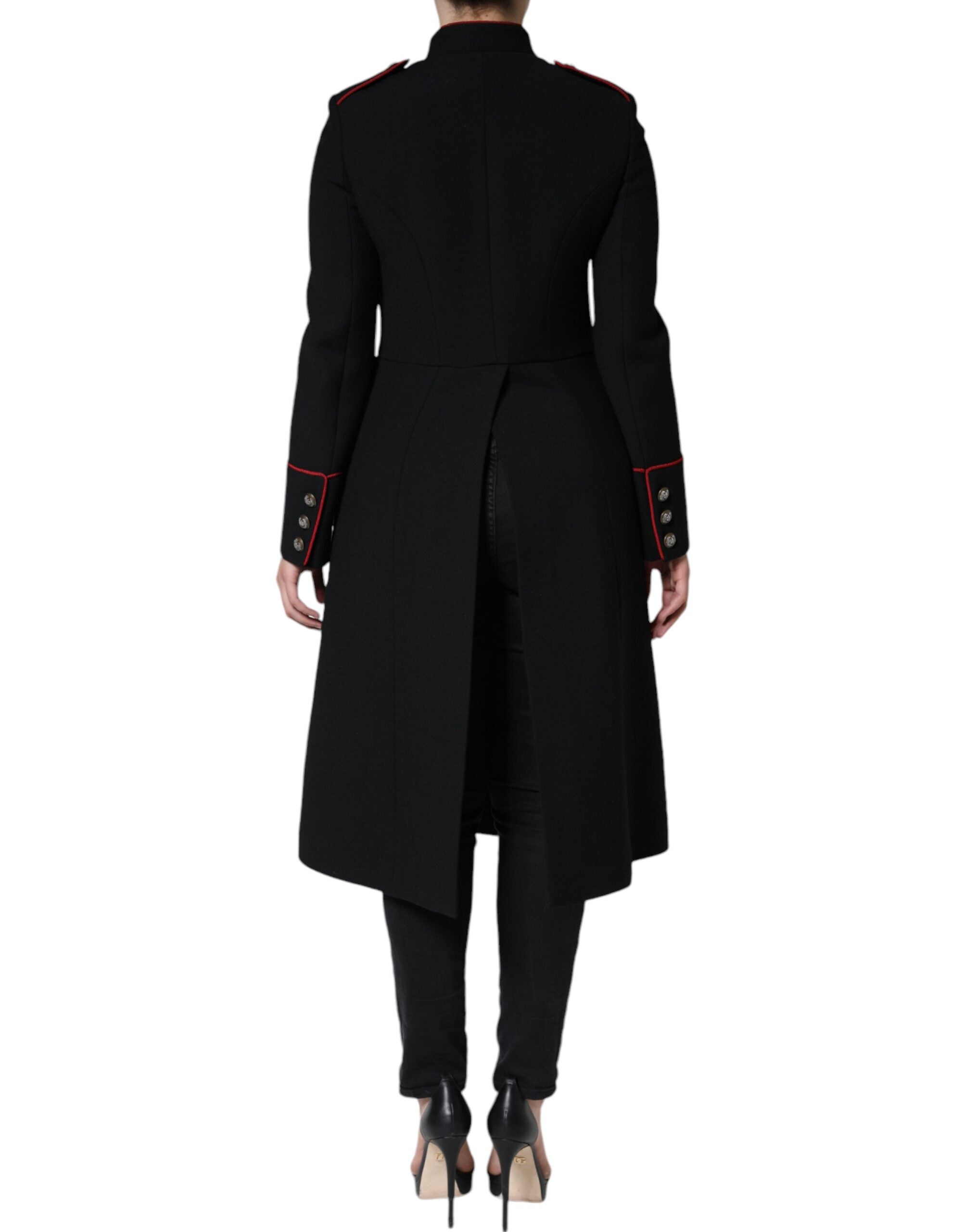 Manteau trench noir à un seul boutonnage de marque Dolce & Gabbana, coupe élégante et classique, visible sur la photo.
