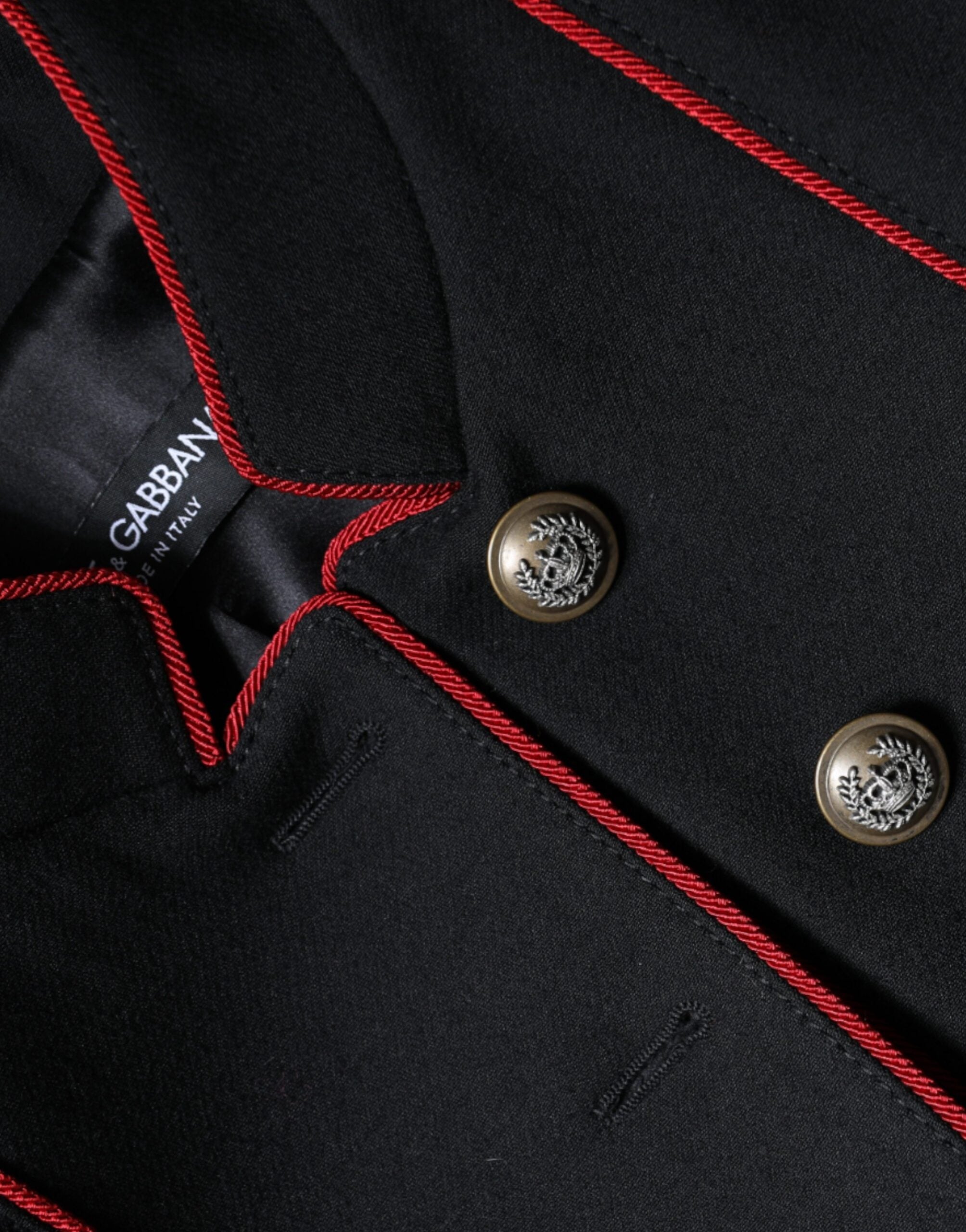 Manteau trench noir à boutonnière simple de Dolce & Gabbana, veste élégante en tissu léger, visible en image.