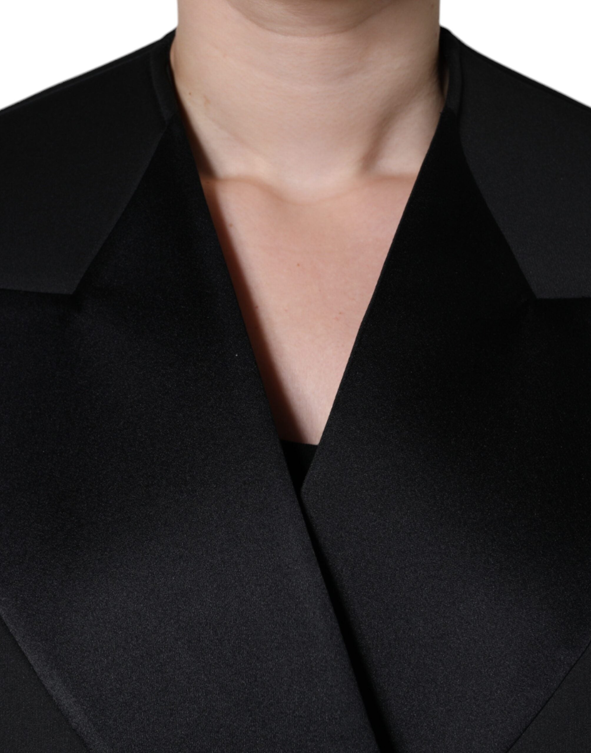Manteau noir en polyester Dolce & Gabbana à double boutonnage, veste élégante avec col large et poches latérales.