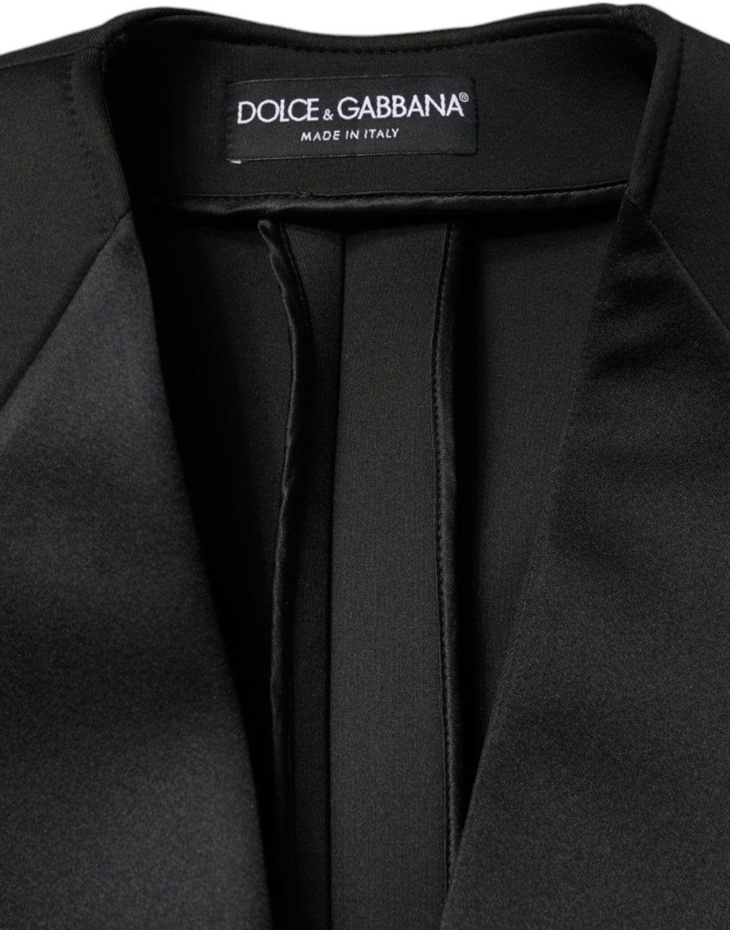 Manteau double boutonnage en polyester noir de Dolce & Gabbana, veste élégante pour femmes ou hommes.