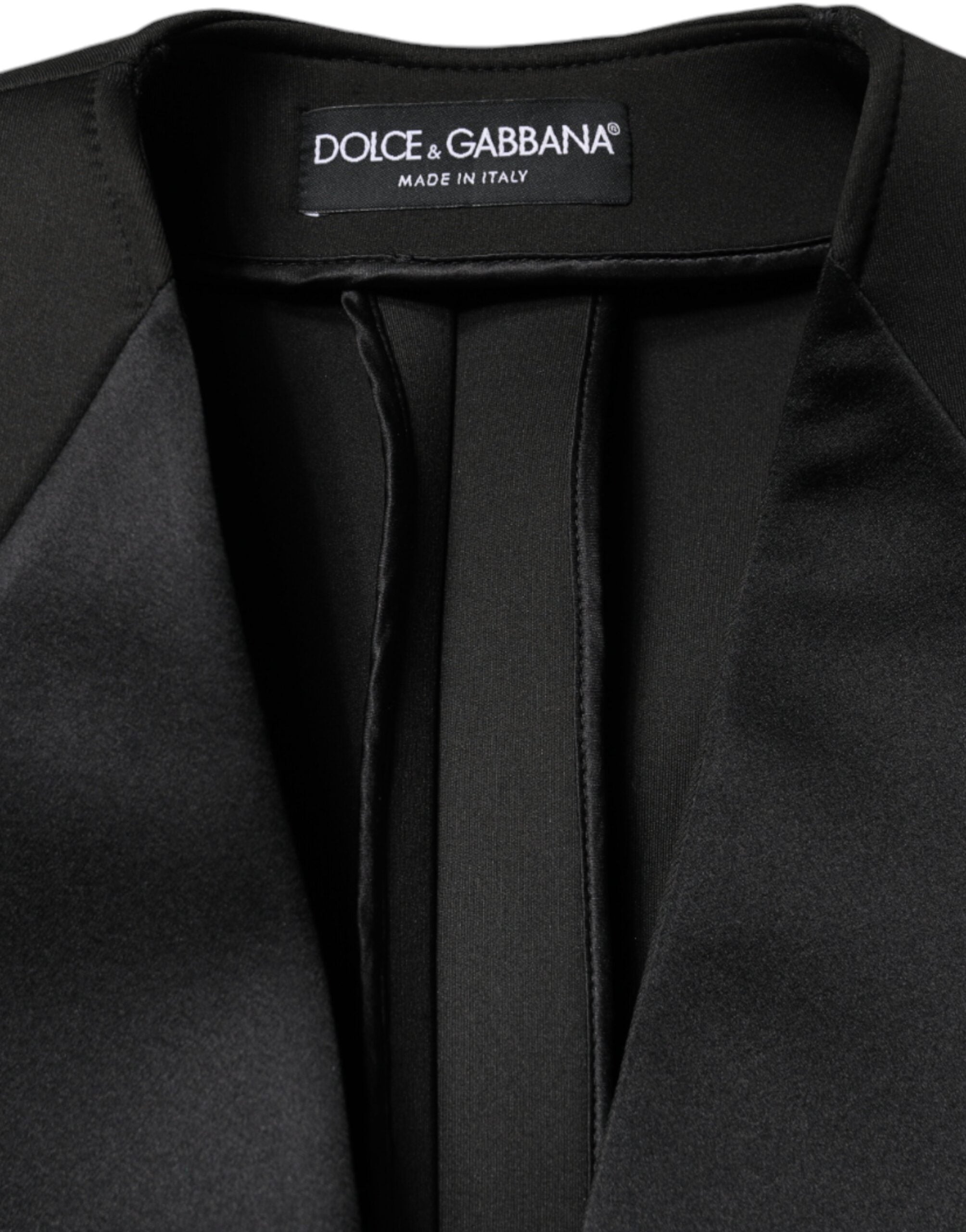 Manteau double boutonnage en polyester noir de Dolce & Gabbana, veste élégante pour femmes ou hommes.