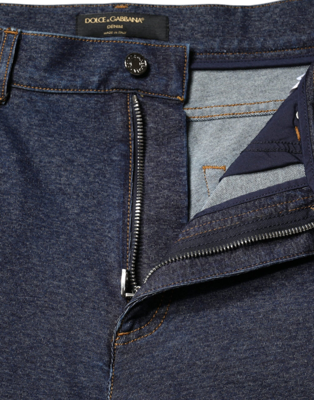 Jeans en denim droit stretch en coton bleu foncé de Dolce & Gabbana, vue de face avec détails de couture visible.