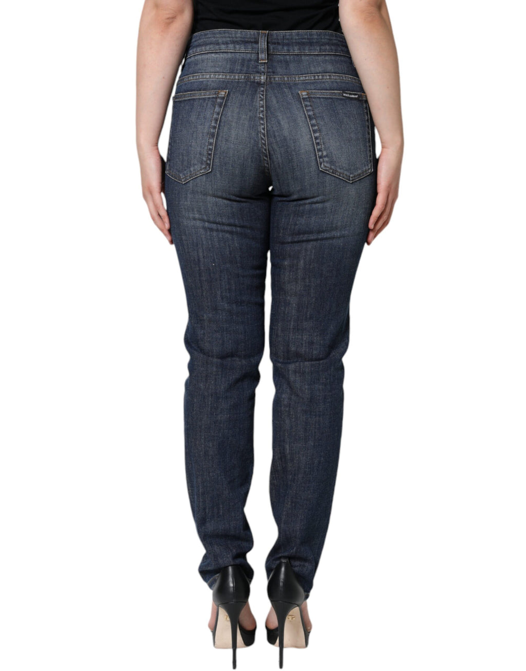 Jean slim en coton stretch bleu foncé Dolce & Gabbana, style skinny, visible détails de la couture et de la texture du denim.