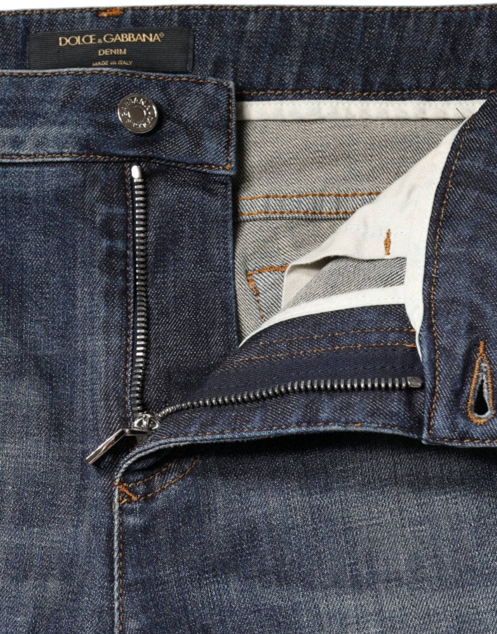 Jean skinny en denim coton stretch bleu foncé de Dolce & Gabbana, coupe ajustée et moderne, visible en image.