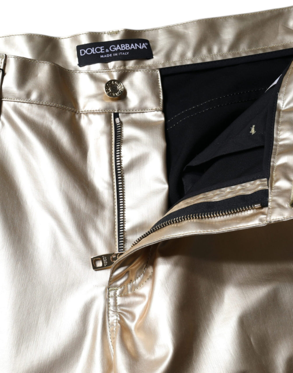 Pantalon en polyester doré métallisé Dolce & Gabbana, coupe tapered, pour un style élégant et tendance.