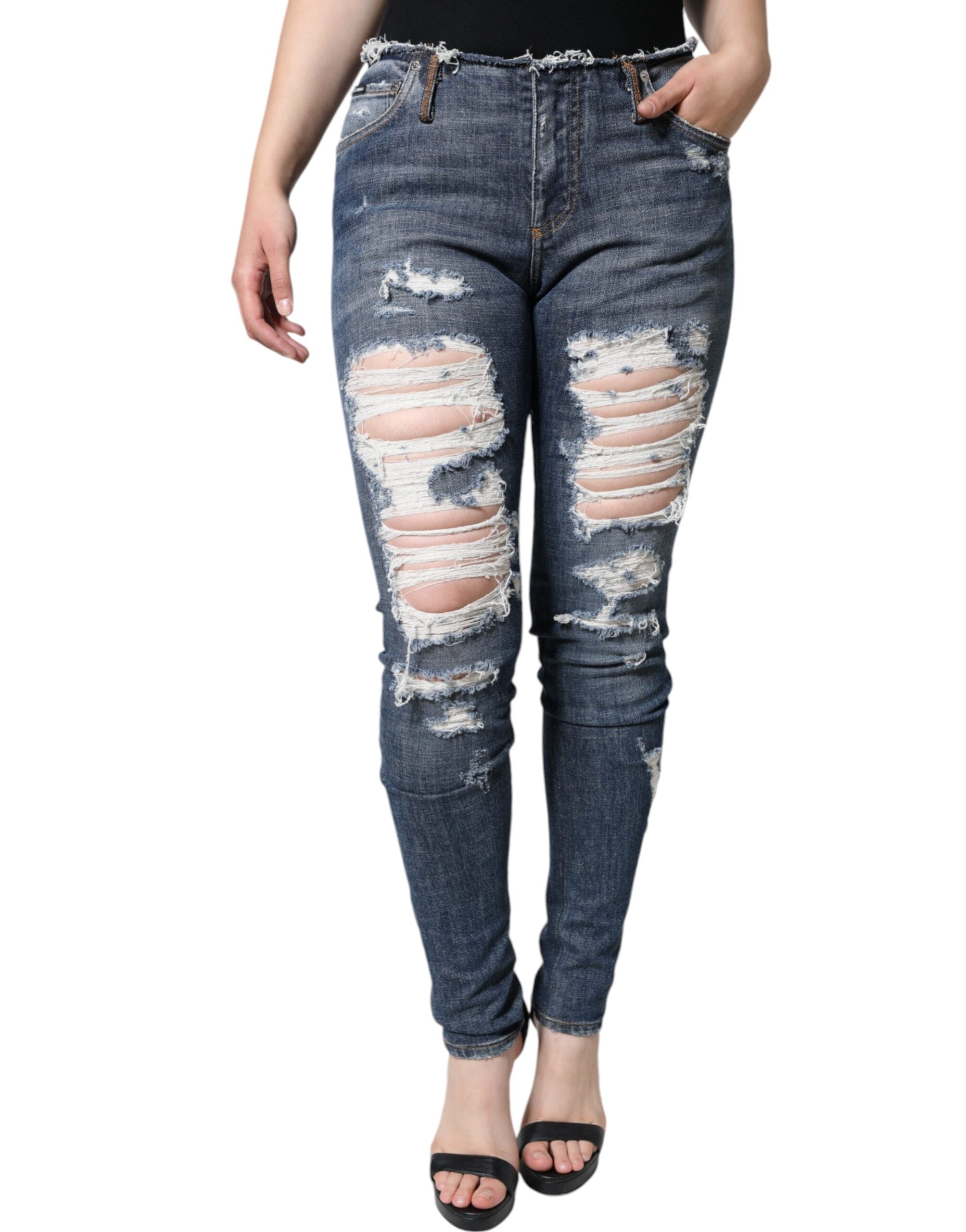 Jean skinny en coton bleu Dolce & Gabbana avec déchirures et coupe stretch, silhouette tendance et décontractée.