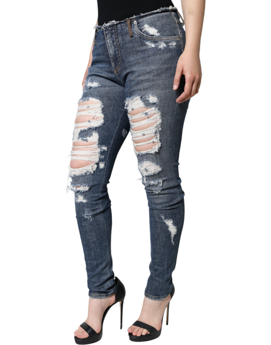 Jeans skinny déchirés en coton stretch bleu Dolce & Gabbana, style tendance avec déchirures et coupe ajustée.