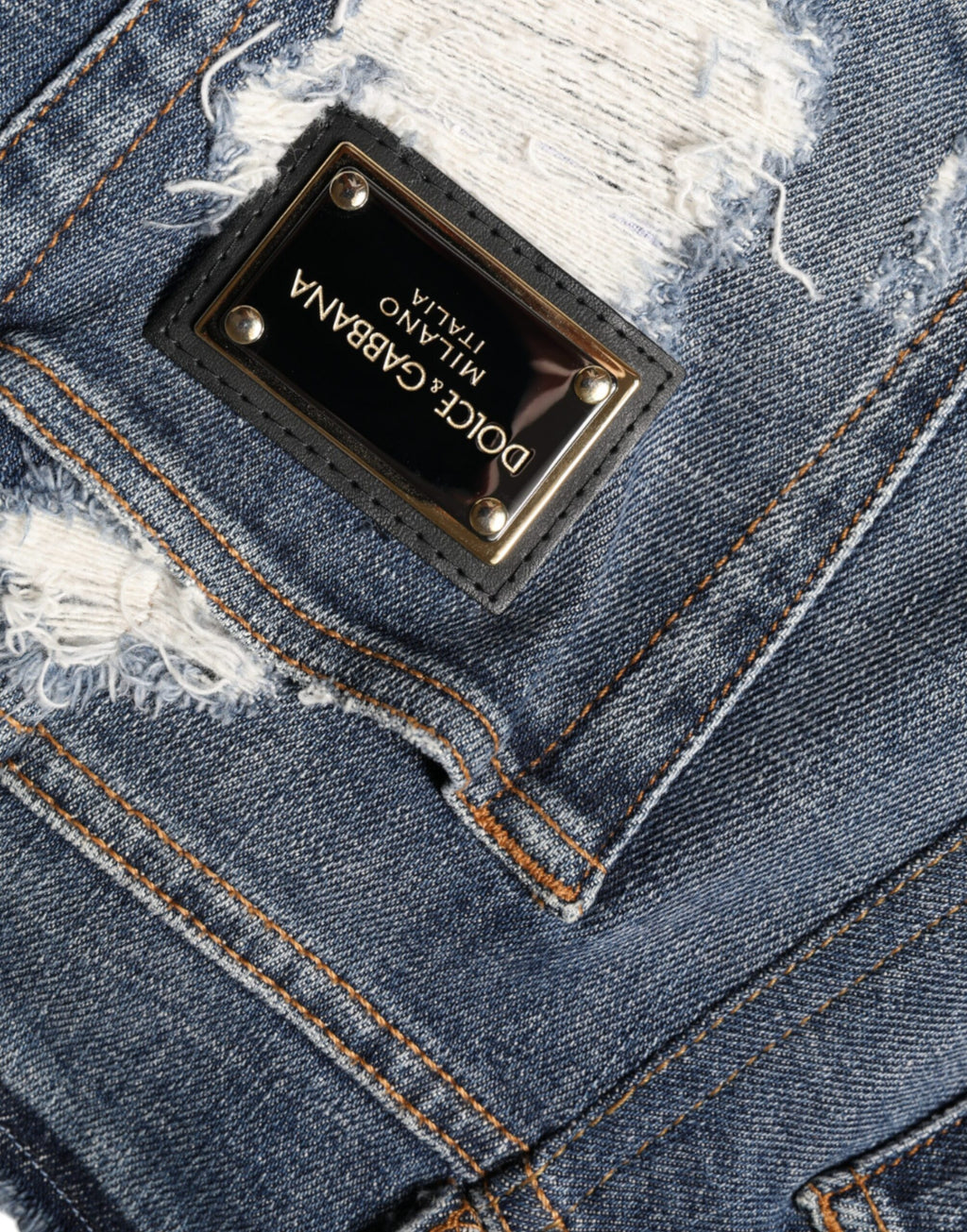 Jeans skinny déchirés en coton stretch bleu Dolce & Gabbana, style tendance et ajusté pour un look moderne.