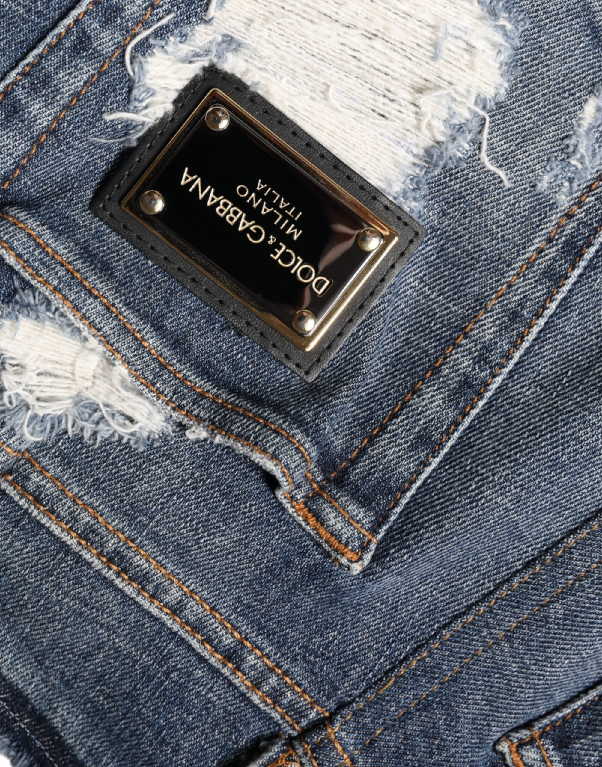 Jeans skinny déchirés en coton stretch bleu Dolce & Gabbana, style tendance et ajusté pour un look moderne.