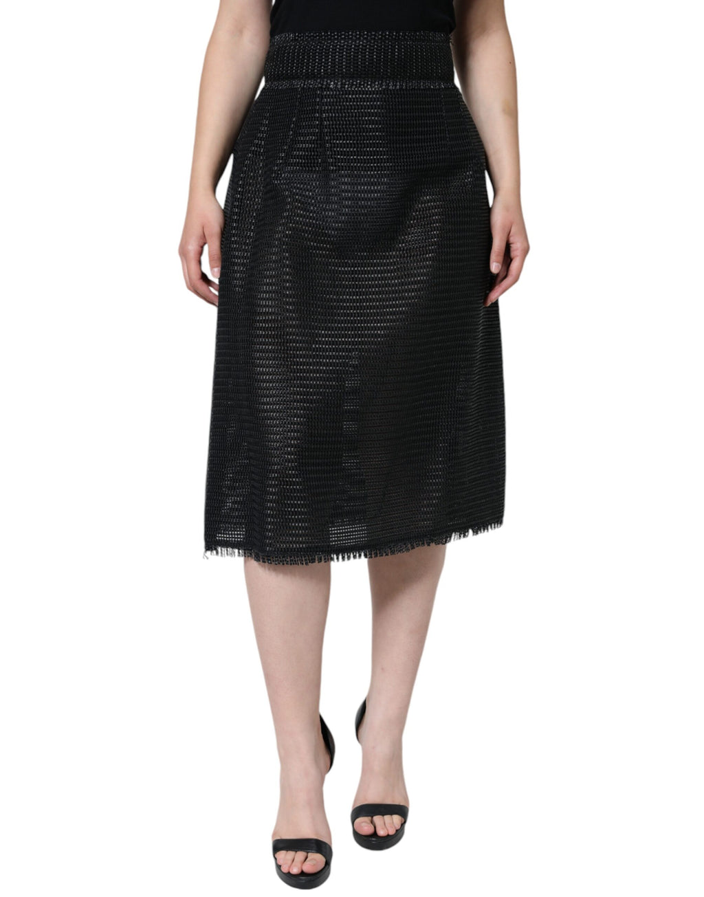 Jupe crayon noire en viscose à taille haute de Dolce & Gabbana, coupe élégante et ajustée, portée avec un haut blanc.