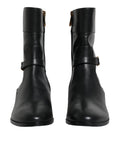 Bottes mi-mollet en cuir noir Dolce & Gabbana avec logo, chaussures élégantes et modernes pour femmes.