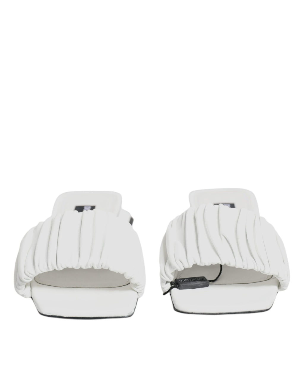 Sandales plates en cuir blanc Dolce & Gabbana, chaussures de style slip-on élégantes et confortables pour femmes.