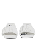 Sandales plates en cuir blanc Dolce & Gabbana, chaussures de style slip-on élégantes et confortables pour femmes.
