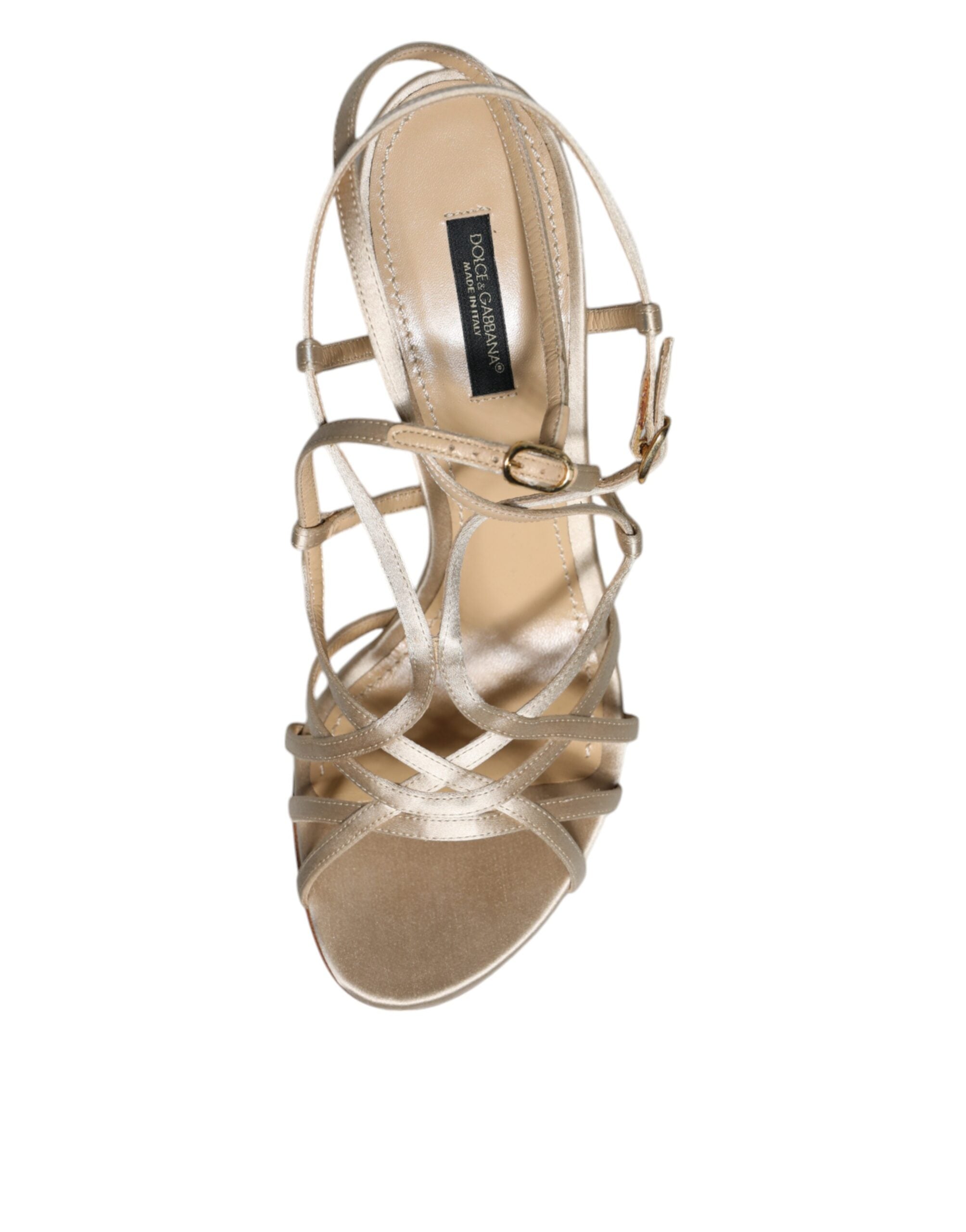 Sandales à talons stilettos en cuir beige de Dolce & Gabbana, chaussures élégantes avec finition raffinée.