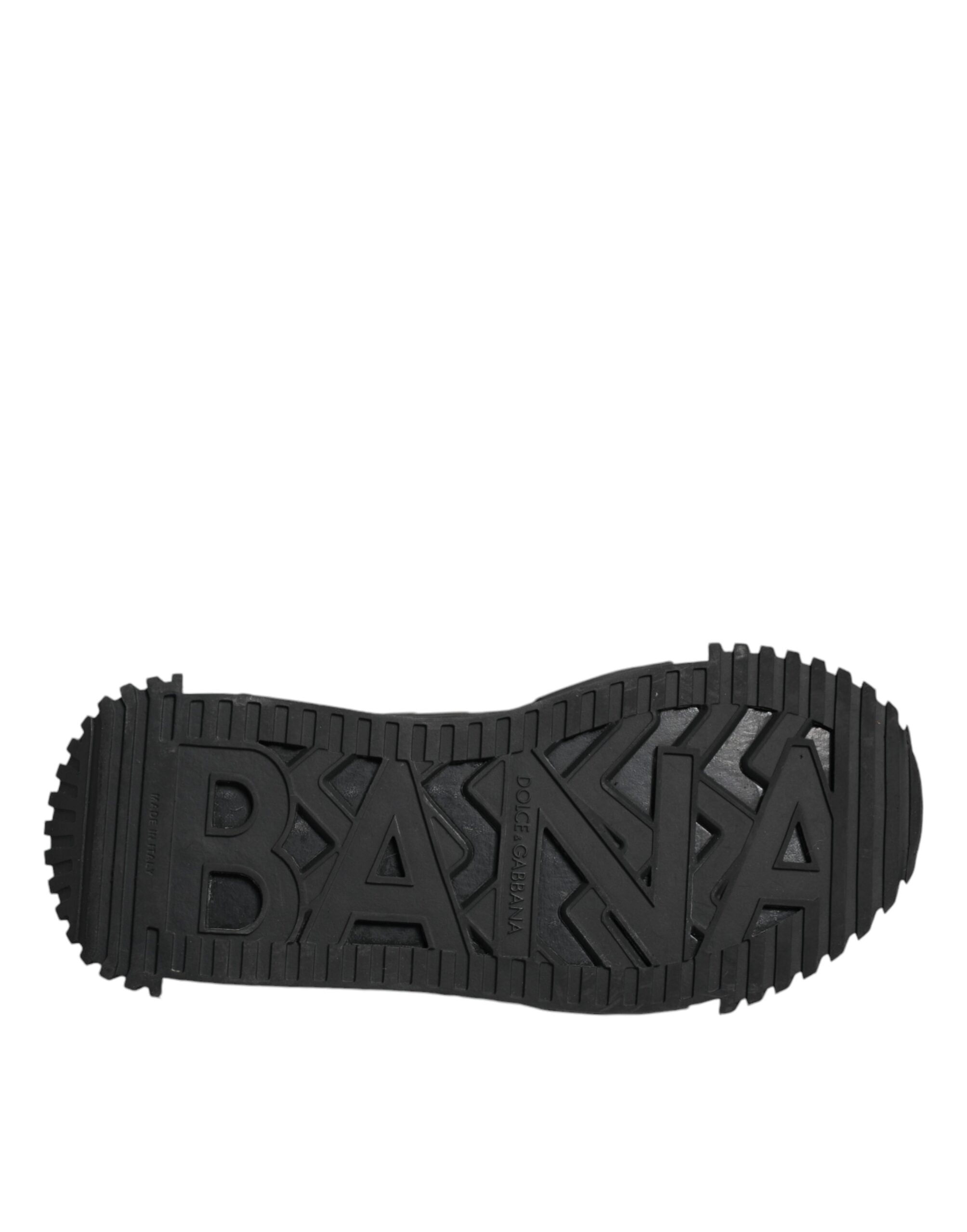 Chaussures Dolce & Gabbana NS1 basses en cuir noir avec logo, lacets et semelle plate, vue de face.